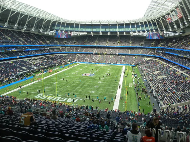 Tottenham Hotspur Stadium before kickoff with the field painted for the NFL and the Jaguars end zone in view